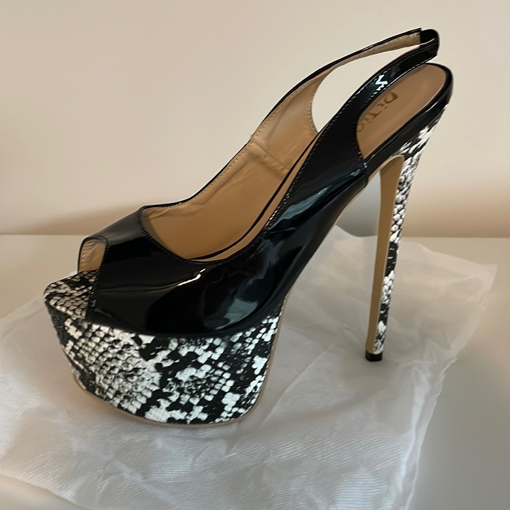 Open toed snake skin heels